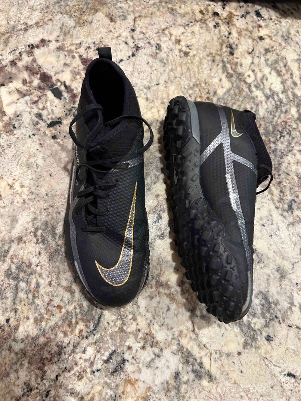 Nike Men’s Black Athletic Turf Shoes with Gold Swoosh and Gray Accents